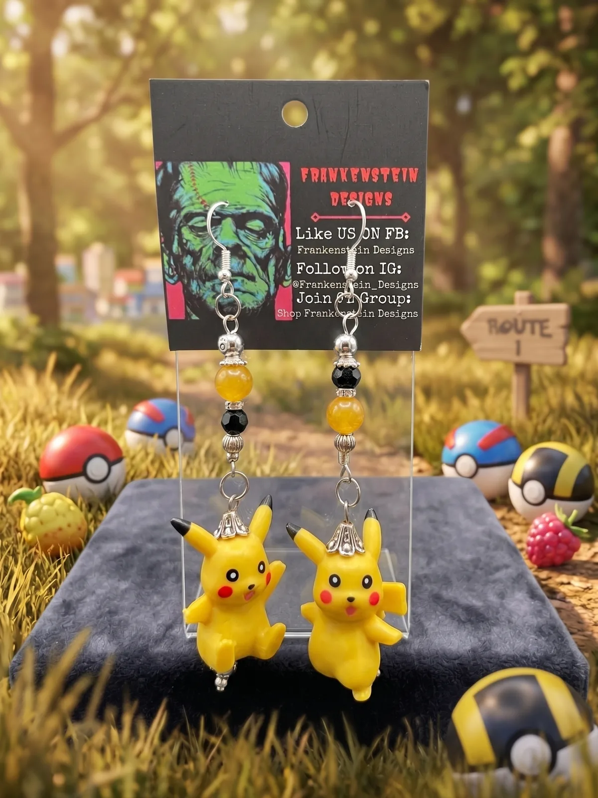 Handmade Pikachu dangle earrings displayed in a colorful game-inspired scene